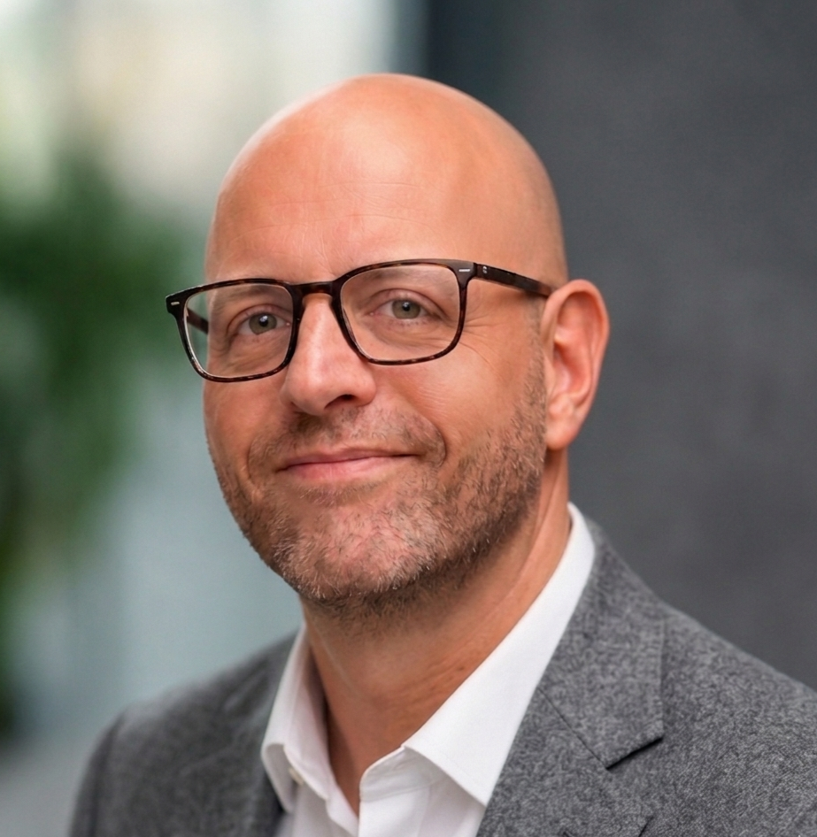 Mark J. Escott Headshot